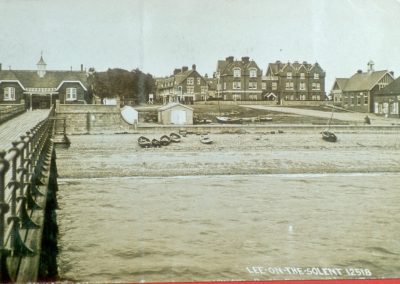 Pier and town,View of pier street before tower complex, 1930,
